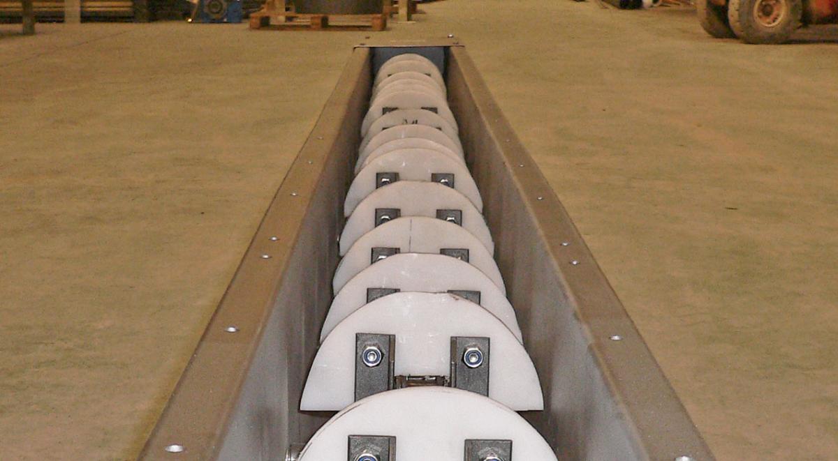 Скребковый трубный конвейер